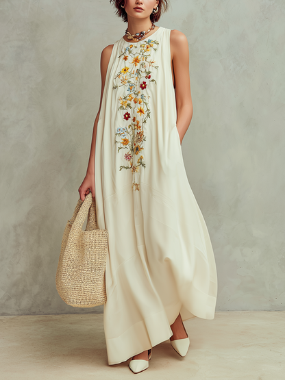 Robe longue ample sans manches, brodée de motifs floraux élégants