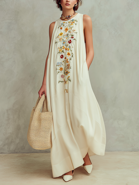 Robe longue ample sans manches, brodée de motifs floraux élégants