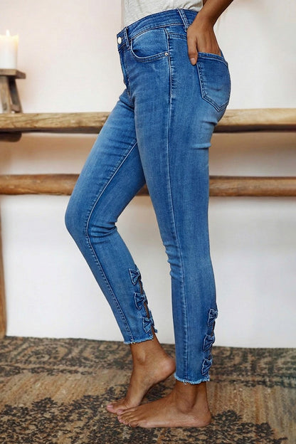 Raw Hem Cut Out Bow Tie Mid Waist Crop Skinny Jeans