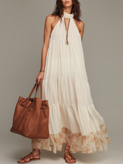 Robe longue dos nu élégante à volants