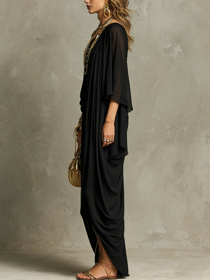 Robe longue bohème noire drapée à une épaule
