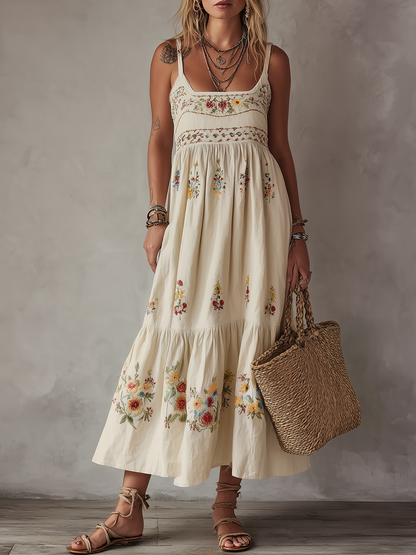 Robe longue bohème blanc ivoire brodée de fleurs avec fines bretelles