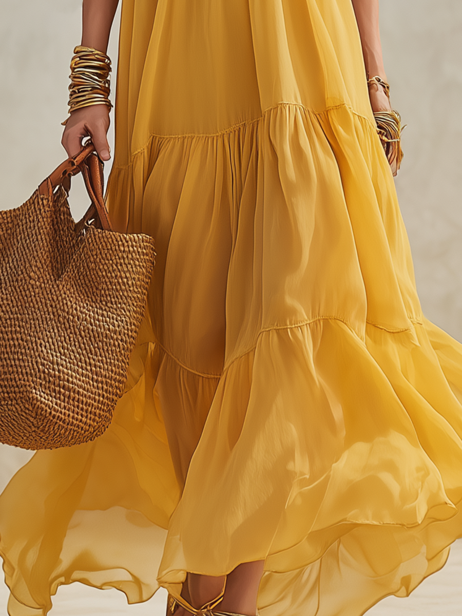 Robe longue en mousseline de soie étagée jaune tournesol vif à épaules dénudées