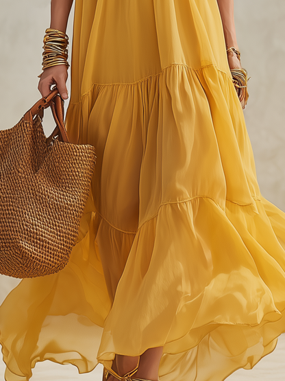 Robe longue en mousseline de soie étagée jaune tournesol vif à épaules dénudées