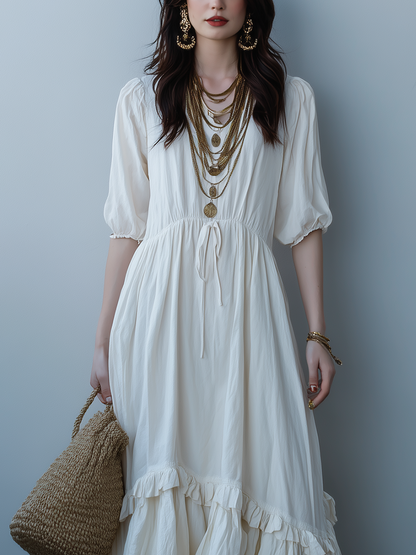 Robe mi-longue blanc ivoire taille haute avec cordon de serrage et ourlet volanté