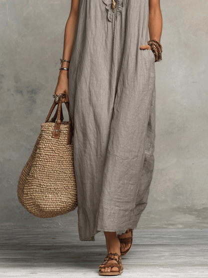 Robe longue bohème sans manches à volants et col en V fluide