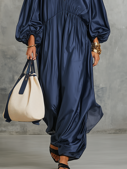 Robe longue drapée bleu marine sophistiquée