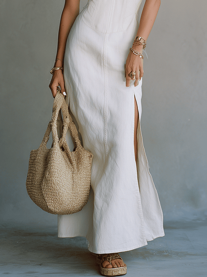 Robe longue élégante blanche minimaliste à fines bretelles et à fente