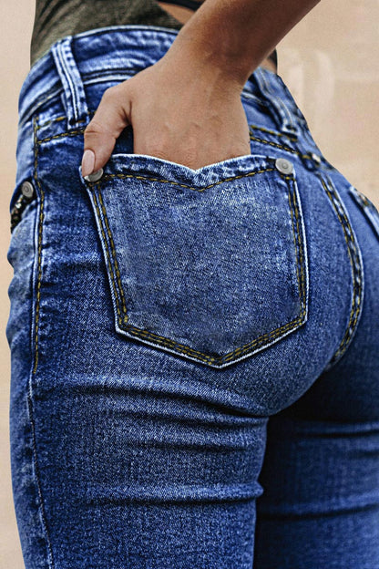 Wash Raw Hem V Cut Pocket Mid Rise Bootcut Jeans