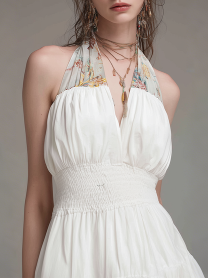 Robe longue élégante à licou et à panneaux imprimés