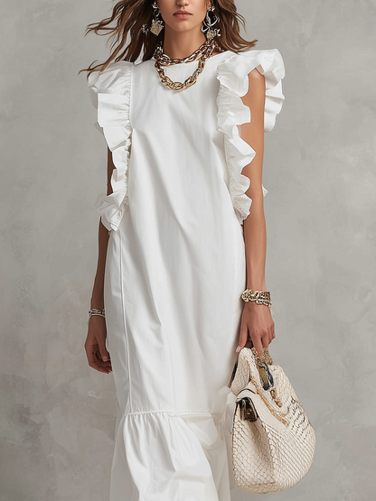 Robe longue blanche élégante à volants style resort