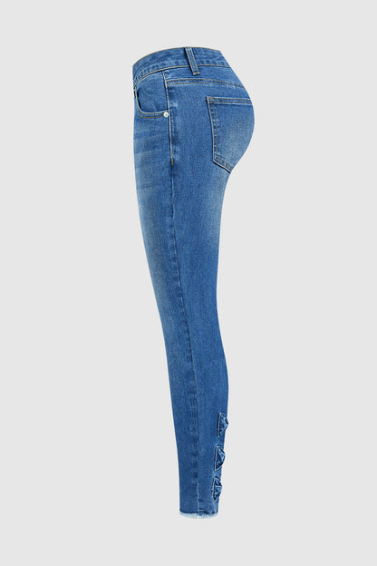 Raw Hem Cut Out Bow Tie Mid Waist Crop Skinny Jeans