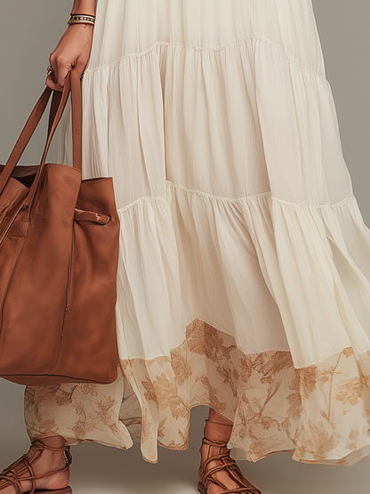 Robe longue dos nu élégante à volants