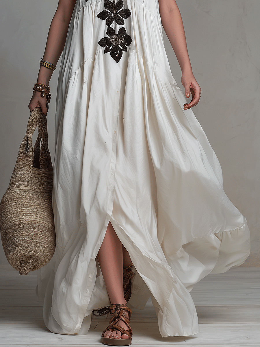 Robe longue élégante à col montant, ornée de fleurs bohèmes