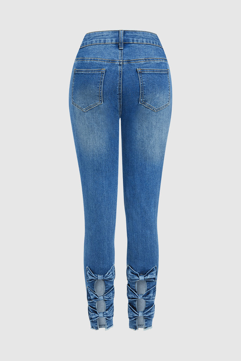 Raw Hem Cut Out Bow Tie Mid Waist Crop Skinny Jeans