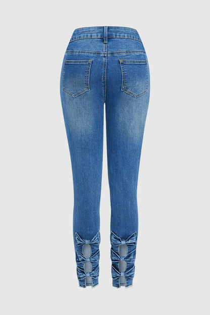 Raw Hem Cut Out Bow Tie Mid Waist Crop Skinny Jeans