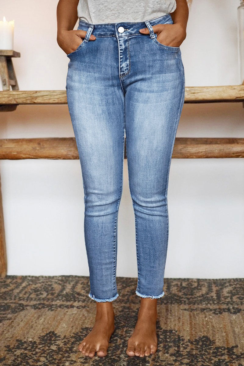 Raw Hem Cut Out Bow Tie Mid Waist Crop Skinny Jeans