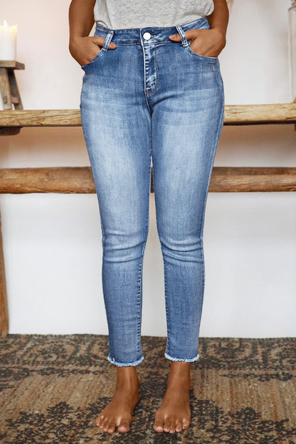 Raw Hem Cut Out Bow Tie Mid Waist Crop Skinny Jeans